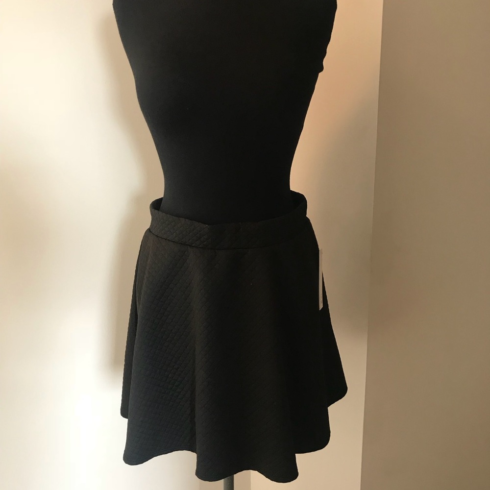 Black mini skirt